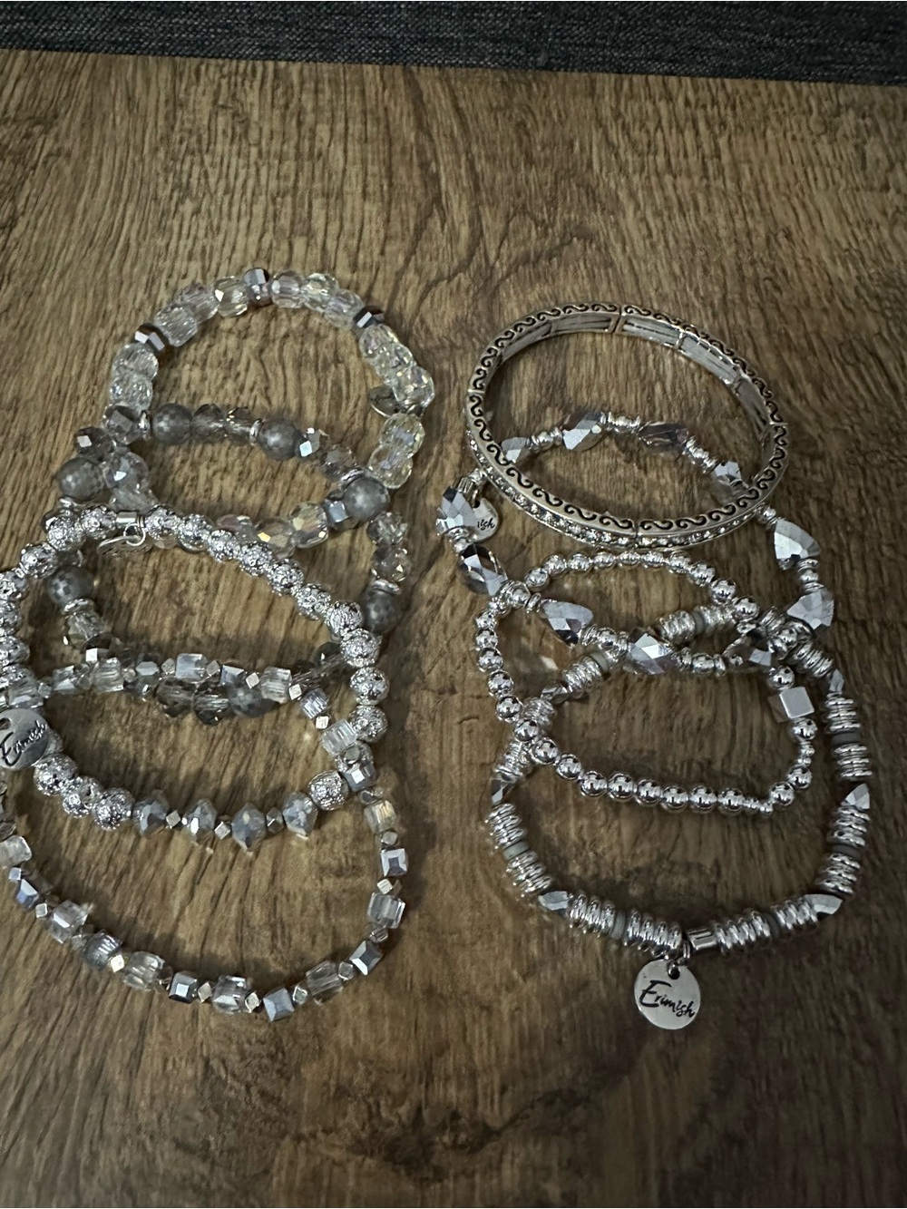 8 stretchy silver bracelets. Excellent condition.
